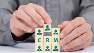 A man Implementing CRM software to streamline organization processes